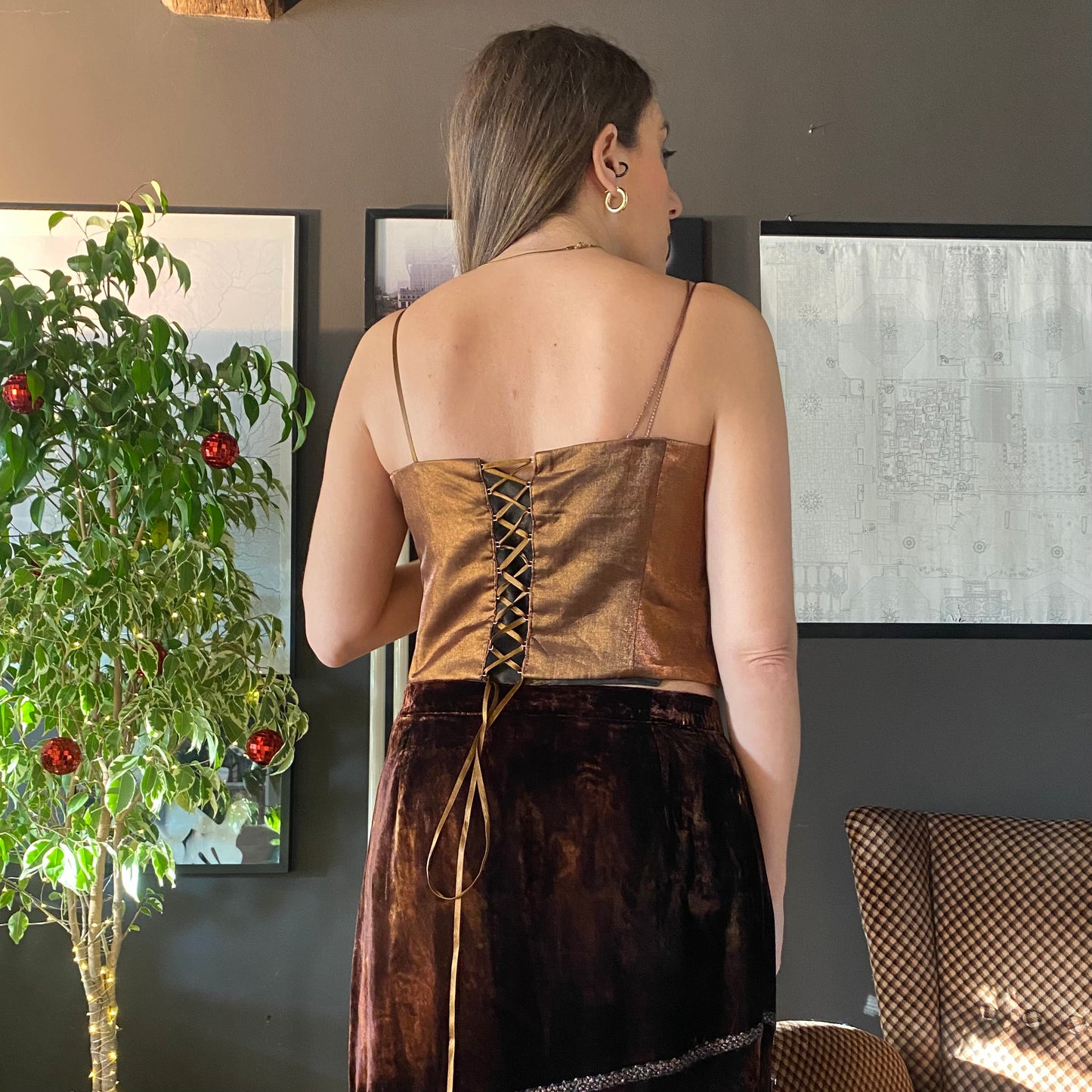 Top corsetto anelli