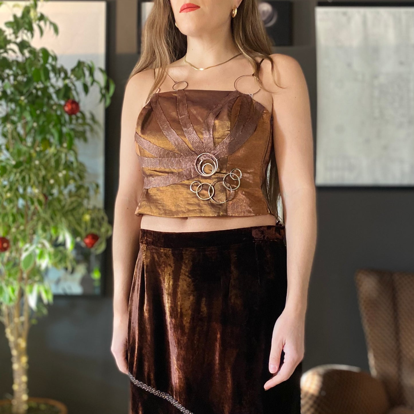 Top corsetto anelli