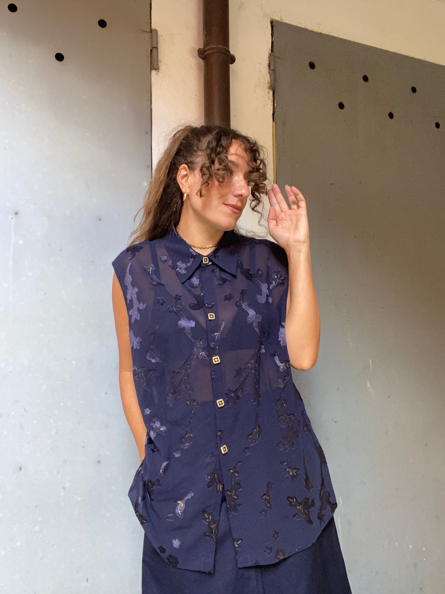 Camicia smanicata trasparente