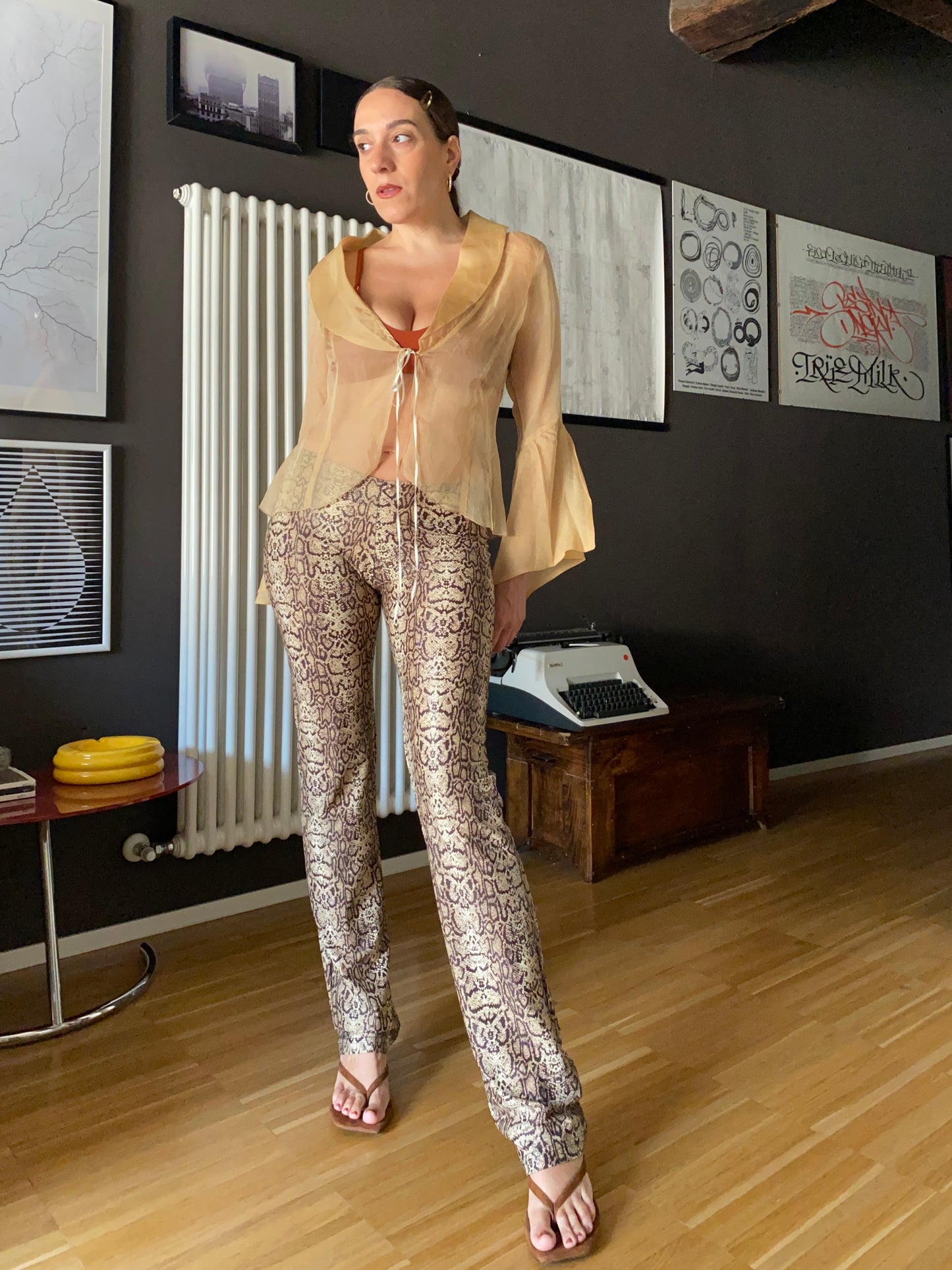 Pantaloni flare stampa pitonata