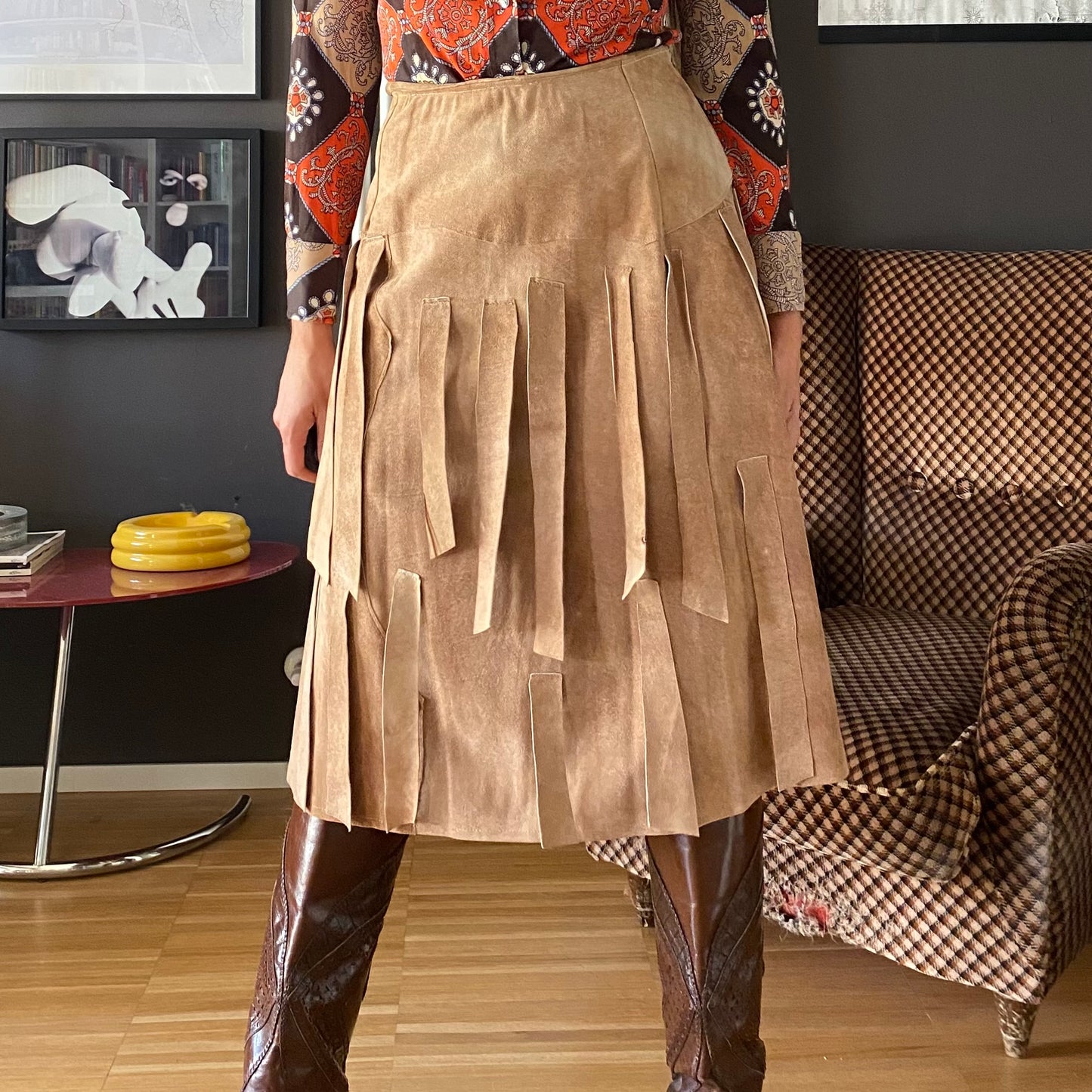 Gonna midi in pelle con frange